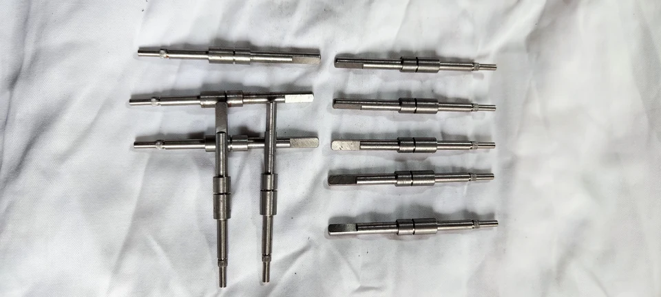 Past custom CNC turned shafts and stepped pins example